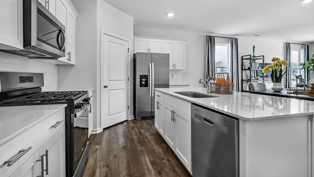 Representative furnished interior of a home built from the Collin by D.R. Horton in The Townes at Anderson Farm, Wendell (Image 7).