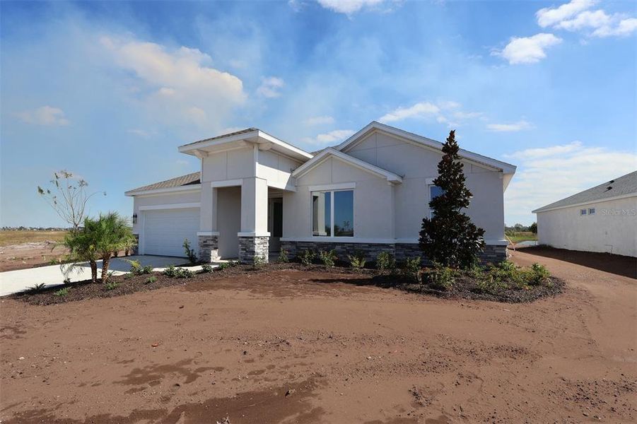 Exterior details and patio area of a home in Coasterra, Palmetto (Image 3).