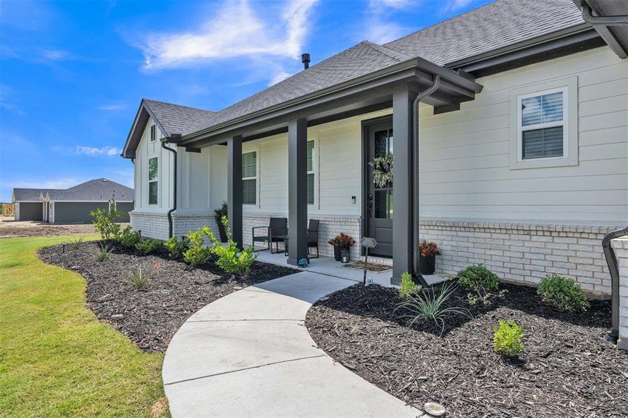 Exterior details and patio area of a home in Gatlin Ranch, Springtown (Image 3).