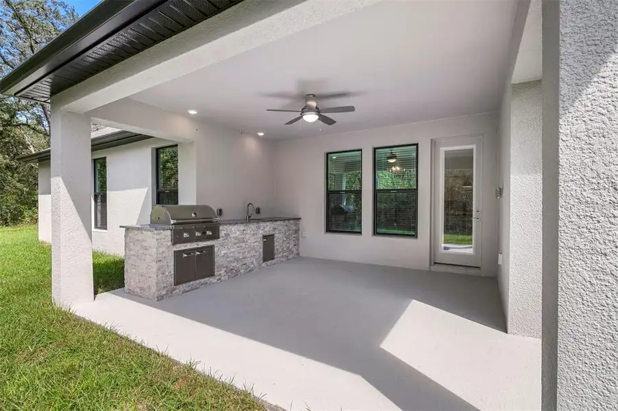 Exterior details and patio area of a home in , Hudson (Image 3). Exterior details and patio area of a home in , Hudson (Image 3).