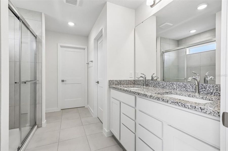 Furnished interior view inside a new home in Grasslands West, Lakeland (Image 11).