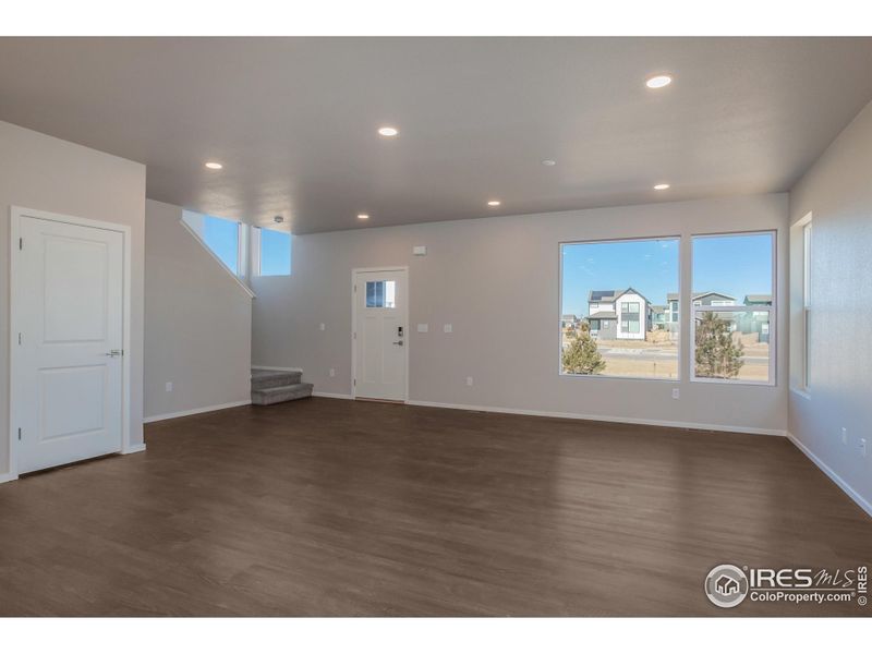 Spacious, unfurnished interior of a new home in Trailside Alley Load - Single Family Homes, Timnath (Image 18).