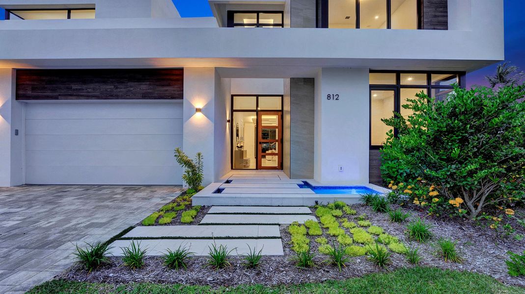 Front exterior of a new home in , Boca Raton, FL, highlighting curb appeal (Image 2). Front exterior of a new home in , Boca Raton, FL, highlighting curb appeal (Image 2).
