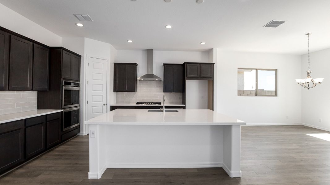 Furnished interior view inside a new home in Windrose, Waddell (Image 7).