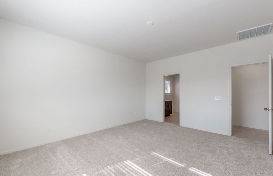 Spacious, unfurnished interior of a new home in Copper Falls, Buckeye (Image 16).