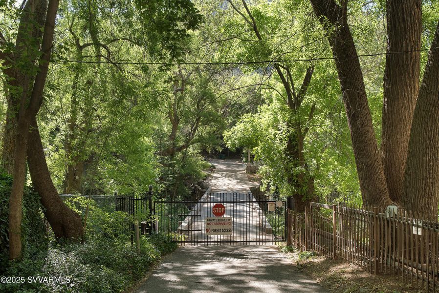 gated entry over creek gated entry over creek