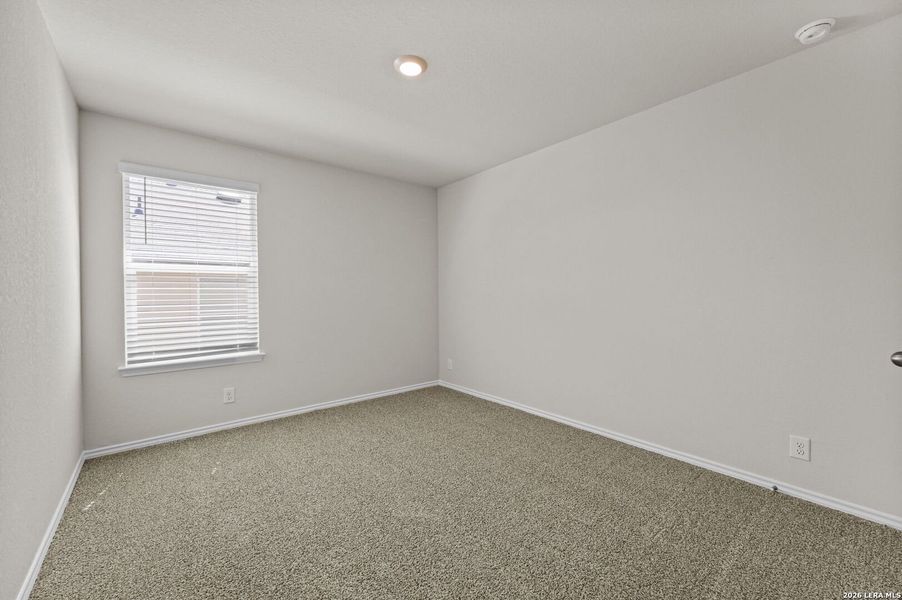 Spacious, unfurnished interior of a new home in Hunters Ranch, San Antonio (Image 11).
