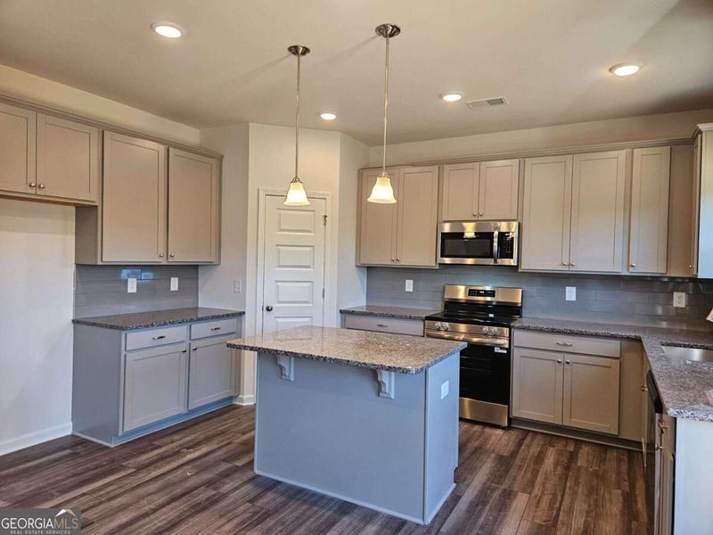 Furnished interior view inside a new home in Maddox Station, Eatonton (Image 6).