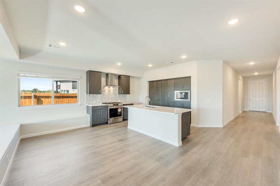 Furnished interior view inside a new home in East Oak Creek Elements, Commerce (Image 14).
