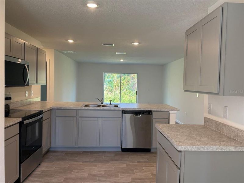 Furnished interior view inside a new home in Poinciana, Poinciana (Image 5).