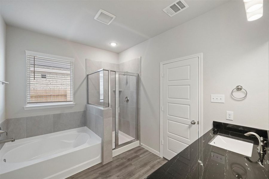 Furnished interior view inside a new home in Sunterra, Katy (Image 8).