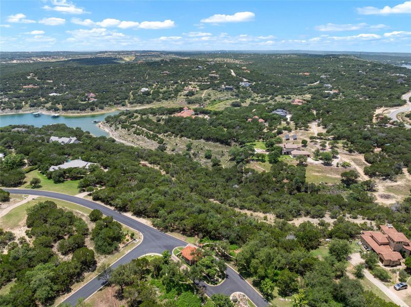 Perched above the sparkling waters, this verdant community offers exclusive lakeside living with mature trees and winding roads. Perched above the sparkling waters, this verdant community offers exclusive lakeside living with mature trees and winding roads.