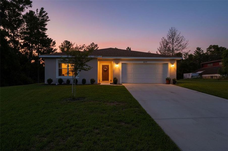 Front exterior of a new home in , Spring Hill, FL, highlighting curb appeal (Image 25).