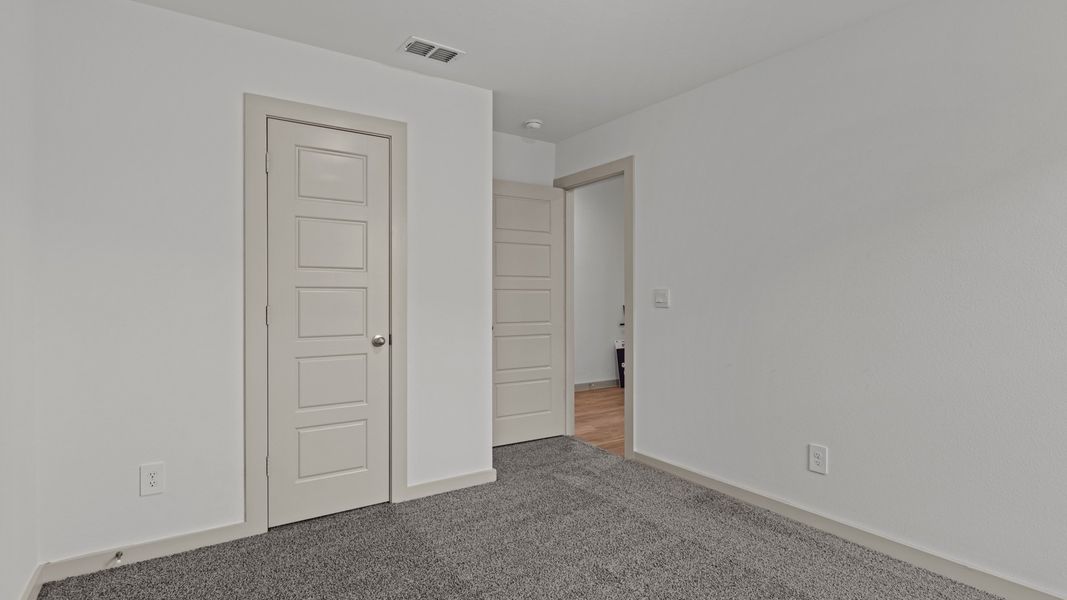 Representative unfurnished interior of a home built from the The Justin by D.R. Horton in Viridian, Lubbock (Image 17).