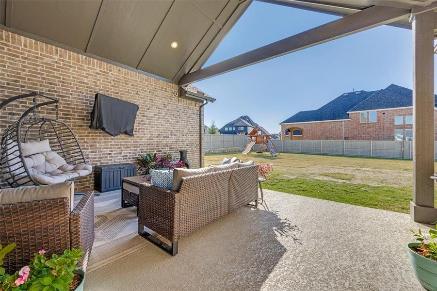 Exterior details and patio area of a home in Pecan Square - Estates, Northlake (Image 19).