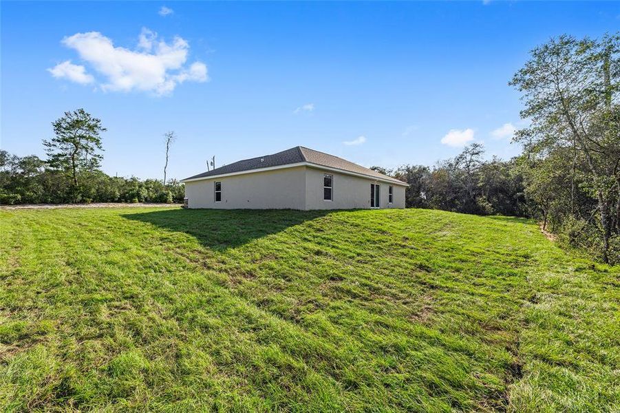 Exterior details and patio area of a home in , Ocala (Image 41).