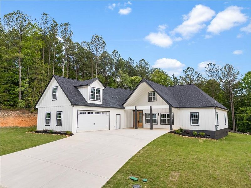 Front exterior of a new home in , Rome, GA, highlighting curb appeal (Image 14).