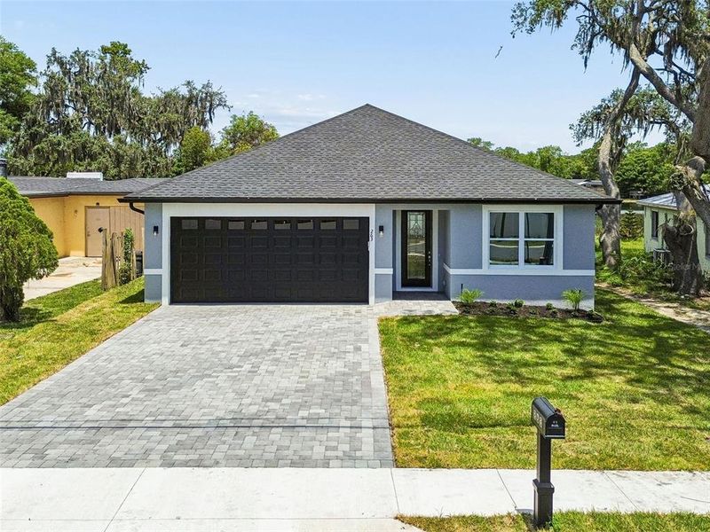 Front exterior of a new home in , Casselberry, FL, highlighting curb appeal (Image 25). Front exterior of a new home in , Casselberry, FL, highlighting curb appeal (Image 25).