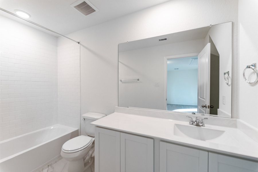 Furnished interior view inside a new home in Cielo, Conroe (Image 11).