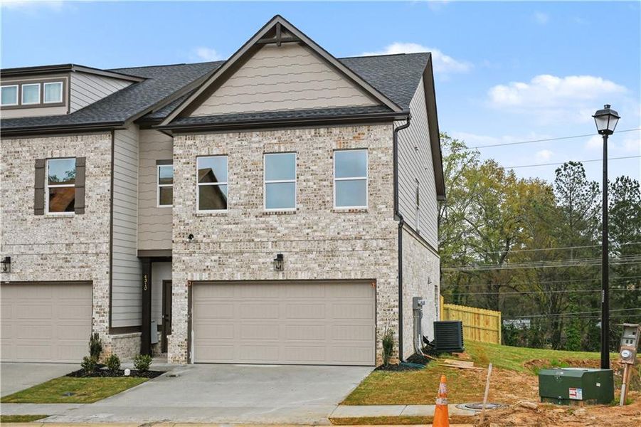 Front exterior of a new home in , Norcross, GA, highlighting curb appeal (Image 17).
