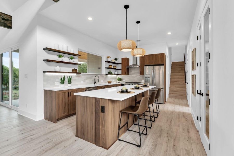 Culinary dreams come alive in this well-appointed kitchen, boasting a spacious island and gleaming stainless steel appliances. Culinary dreams come alive in this well-appointed kitchen, boasting a spacious island and gleaming stainless steel appliances.
