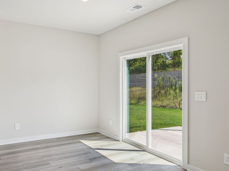 The open-concept floorplan allows for an easy flow between the kitchen and dining areas.