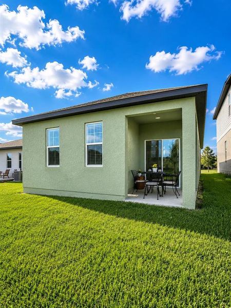 Exterior details and patio area of a home in , Groveland (Image 3).