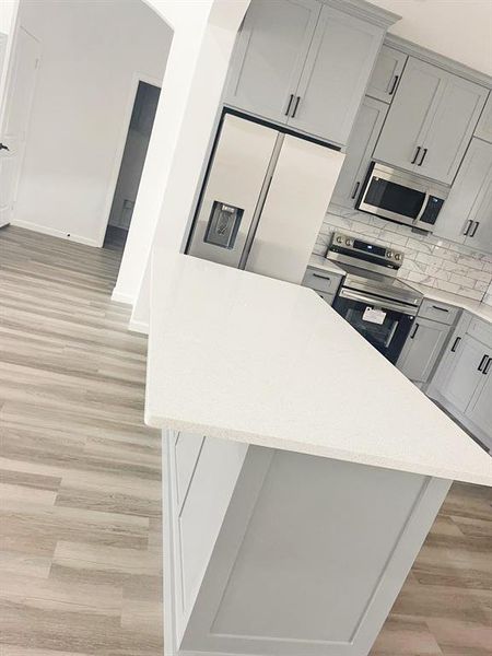 Furnished interior view inside a new home in , Whitney (Image 6).