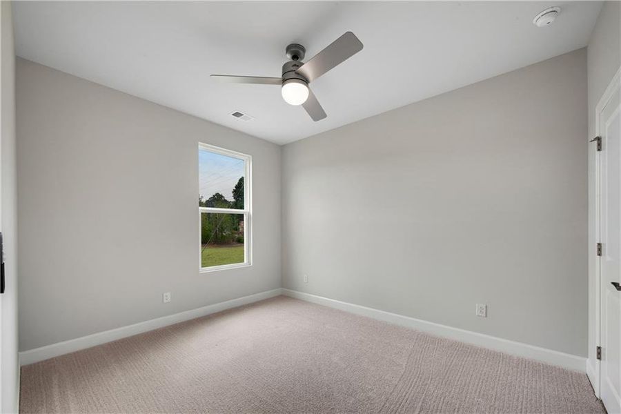 Spacious, unfurnished interior of a new home in Lakecrest, Buford (Image 24).