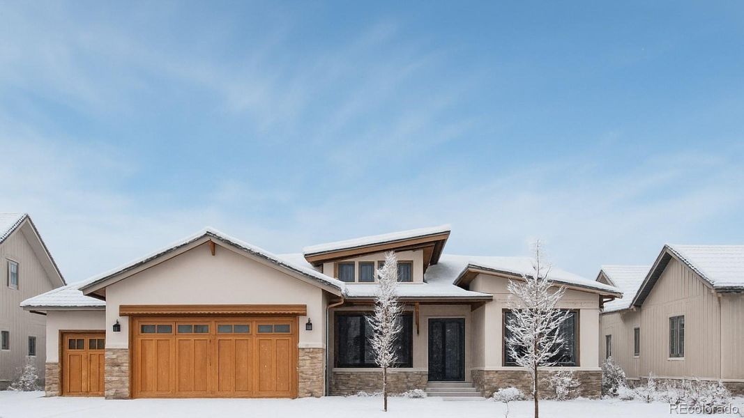 Front exterior of a new home in , Berthoud, CO, highlighting curb appeal (Image 21).