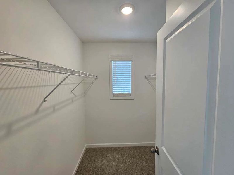 Bedroom Four Walk-In Closet