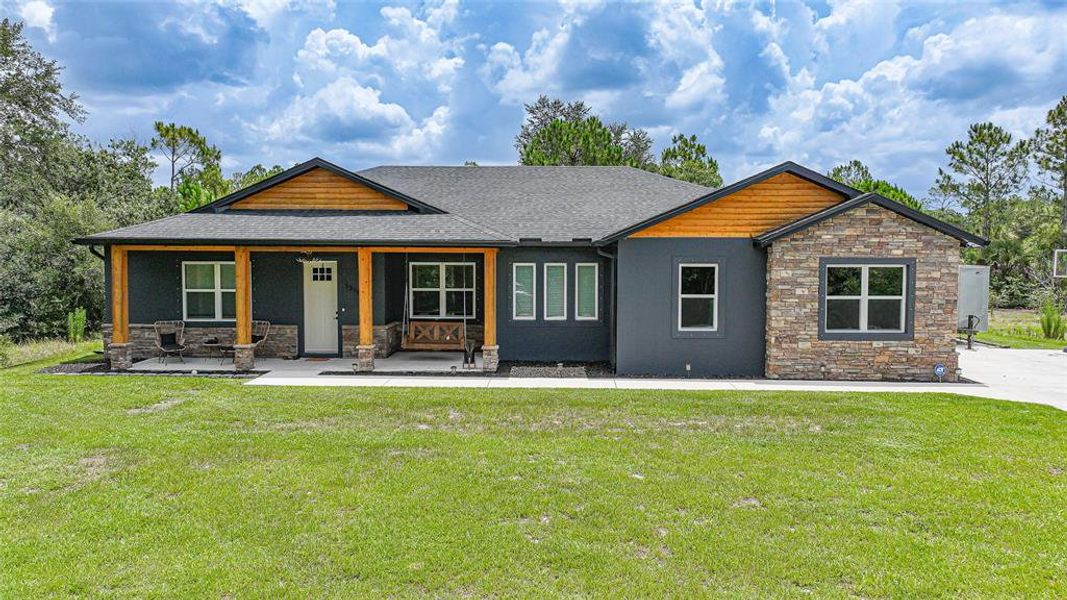 Front exterior of a new home in , Punta Gorda, FL, highlighting curb appeal (Image 25). Front exterior of a new home in , Punta Gorda, FL, highlighting curb appeal (Image 25).