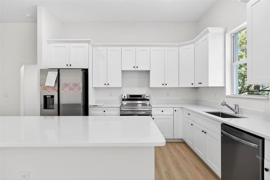 Furnished interior view inside a new home in , Punta Gorda (Image 9).