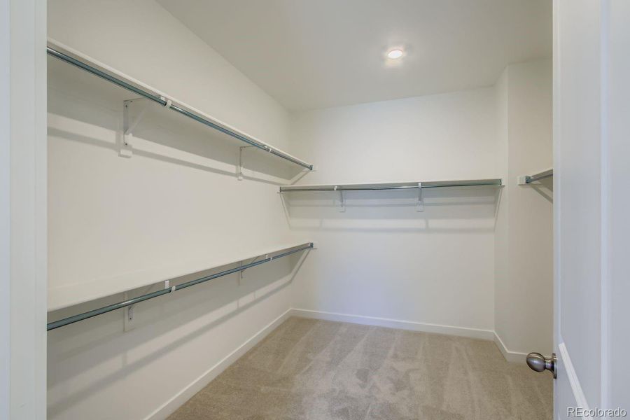 Spacious, unfurnished interior of a new home in Ken-Caryl Ranch: The Monarch Collection, Littleton (Image 9).