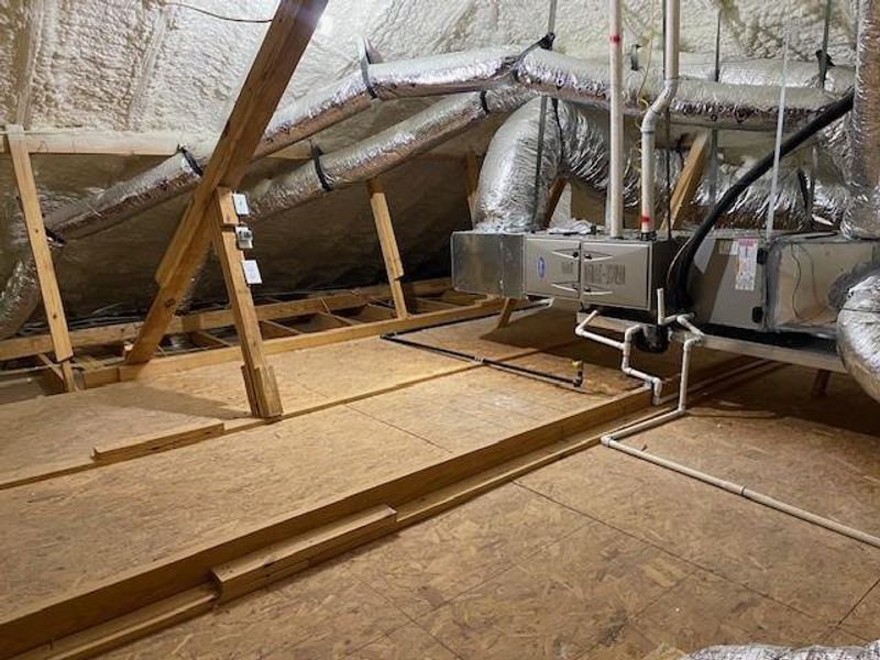 Floor decking in attic for extra storage and easy access to HVAC Floor decking in attic for extra storage and easy access to HVAC