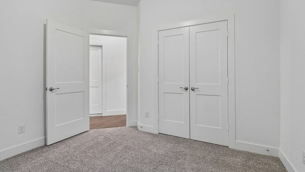 Spacious, unfurnished interior of a new home in Meridiana Townhomes, Manvel (Image 32).