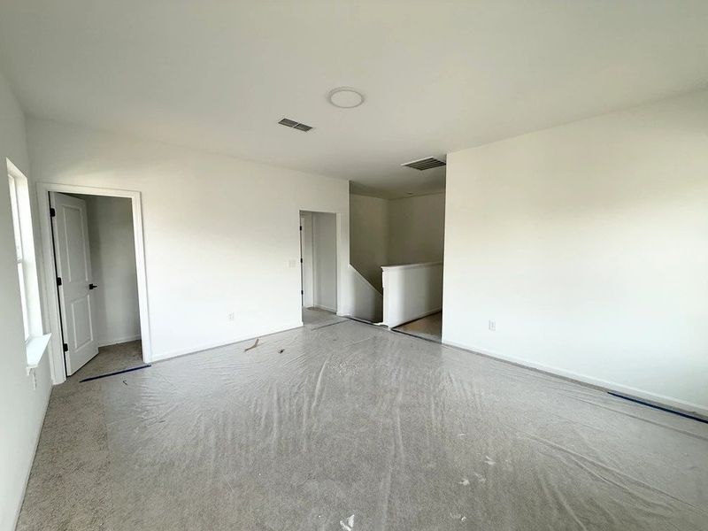 Loft featuring AW Collection® Oxford - Flexible living in a refined, welcoming space.