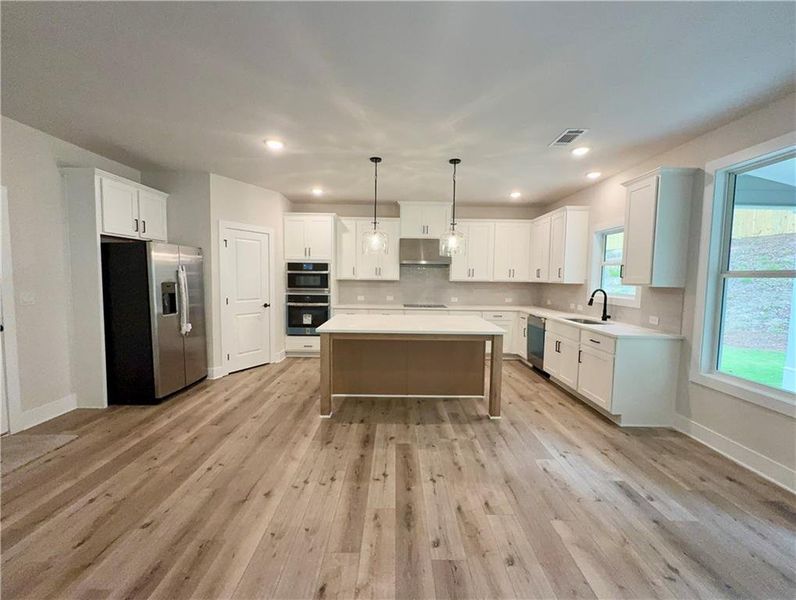 Furnished interior view inside a new home in , Hoschton (Image 11).