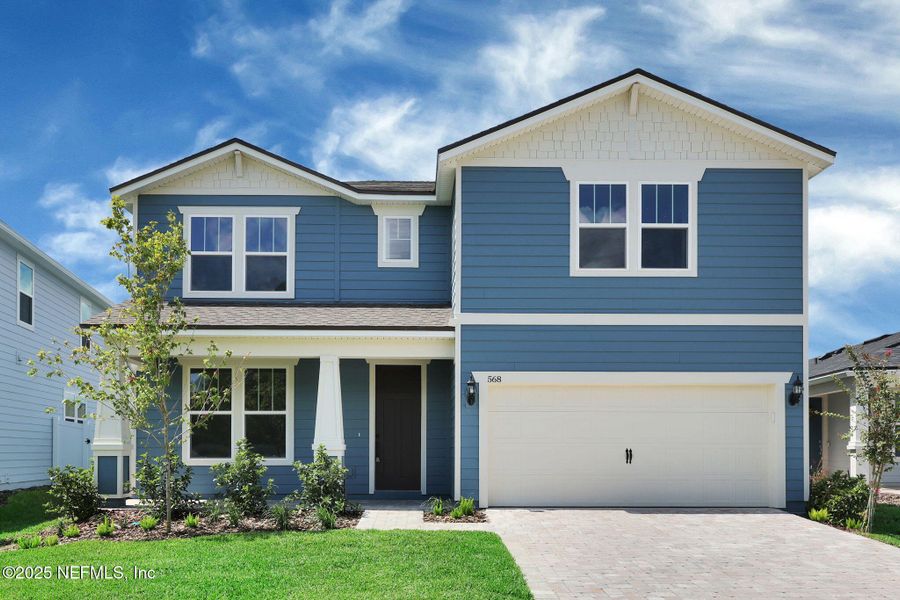 Front exterior of a new home in The Preserve at Bannon Lakes, St. Augustine, FL, highlighting curb appeal (Image 1). Front exterior of a new home in The Preserve at Bannon Lakes, St. Augustine, FL, highlighting curb appeal (Image 1).