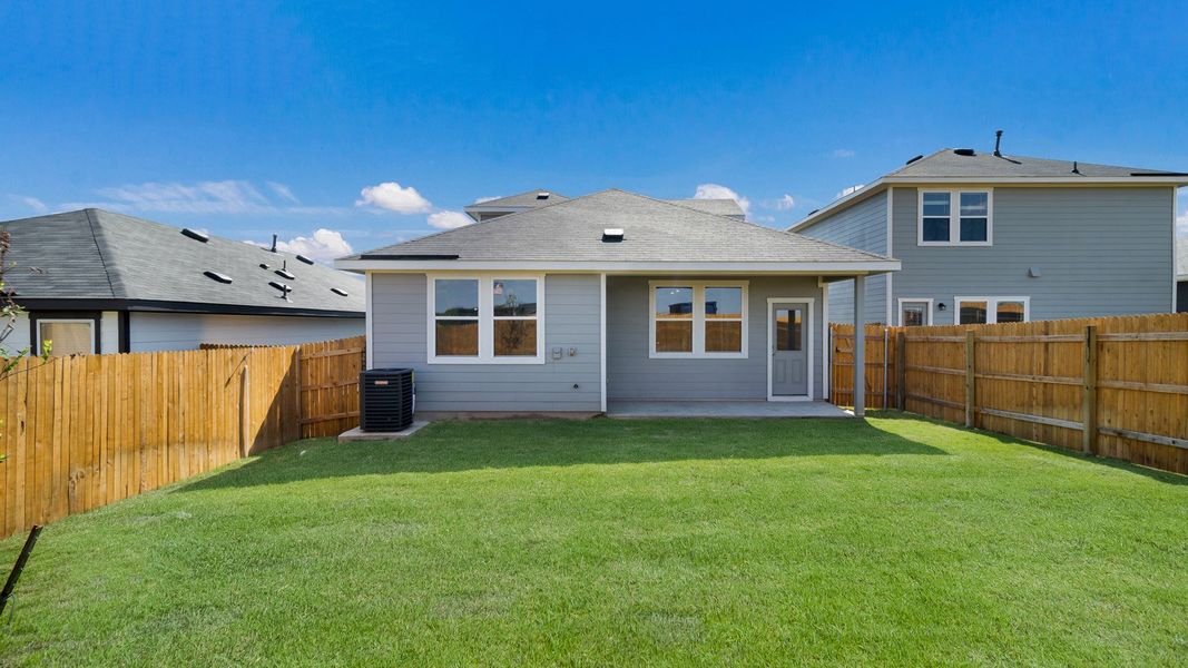 Representative exterior photo of a completed home built from the The Periwinkle by D.R. Horton in Marigold, Kyle, TX (Image 16). Representative exterior photo of a completed home built from the The Periwinkle by D.R. Horton in Marigold, Kyle, TX (Image 16).