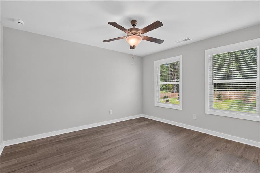 Spacious, unfurnished interior of a new home in The Cottages at East Lanier, Fayetteville (Image 18).