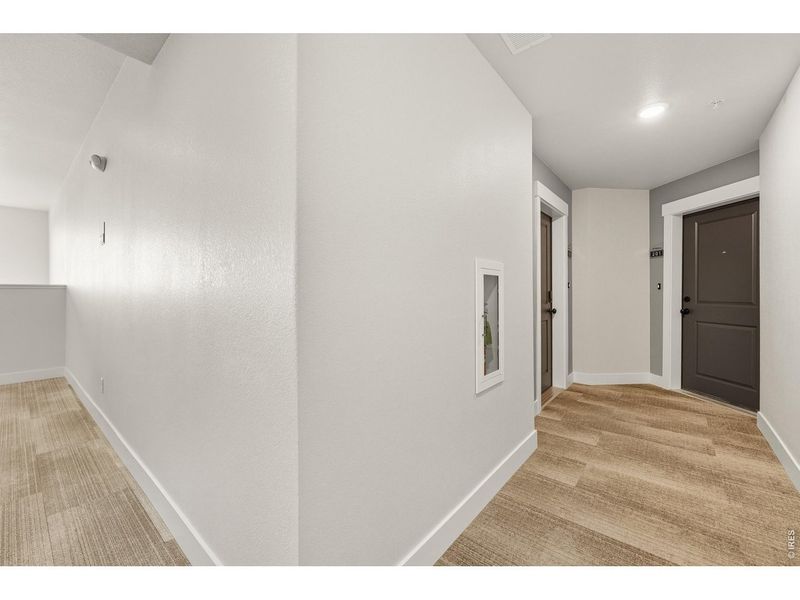 Spacious, unfurnished interior of a new home in The Lakes at Centerra - North Shore Flats, Loveland (Image 13).