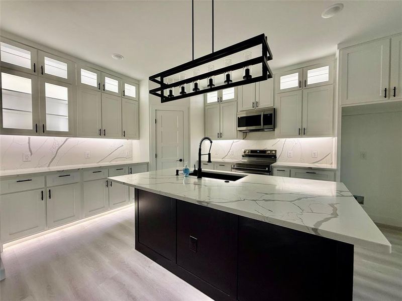 Kitchen with cabinet lighst on