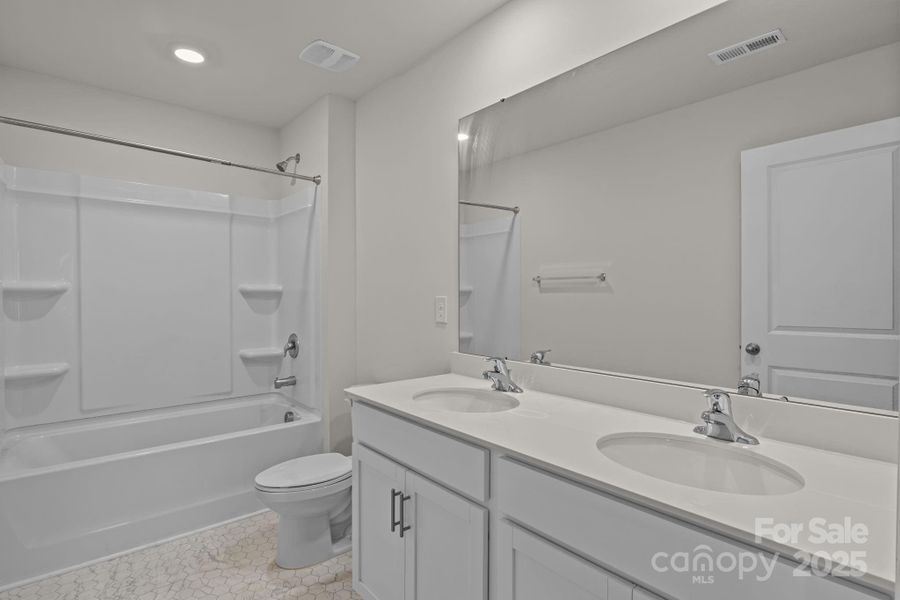 Furnished interior view inside a new home in Mills at Long Creek, Dallas (Image 12).