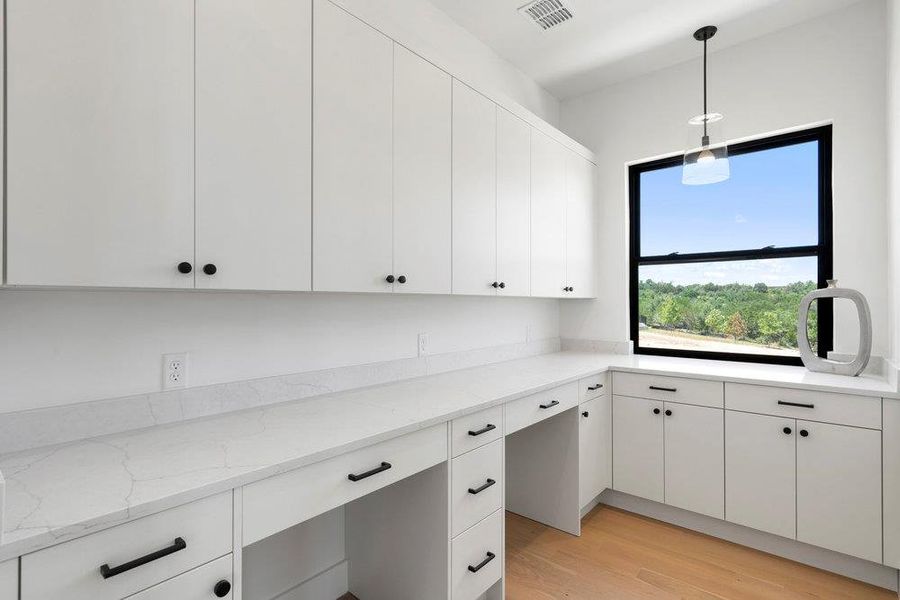 Furnished interior view inside a new home in Milky Way at River Place, Austin (Image 31).