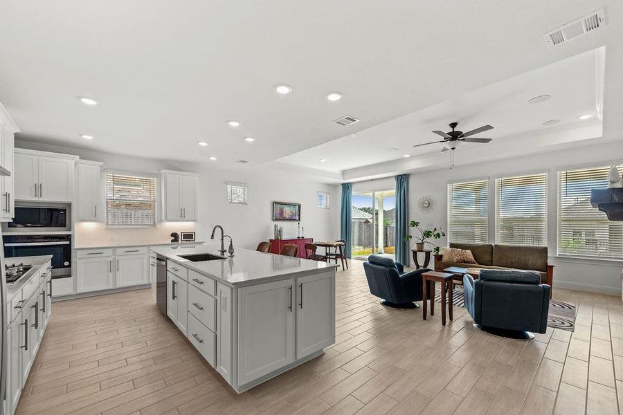 The open concept living space here is simple and clean.