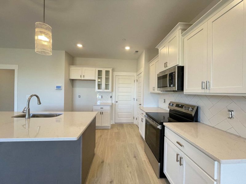 Furnished interior view inside a new home in The Grove at Kennesaw Farms, Gallatin (Image 5).