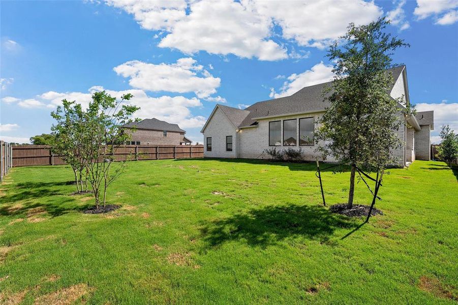 Exterior details and patio area of a home in , Hewitt (Image 27).