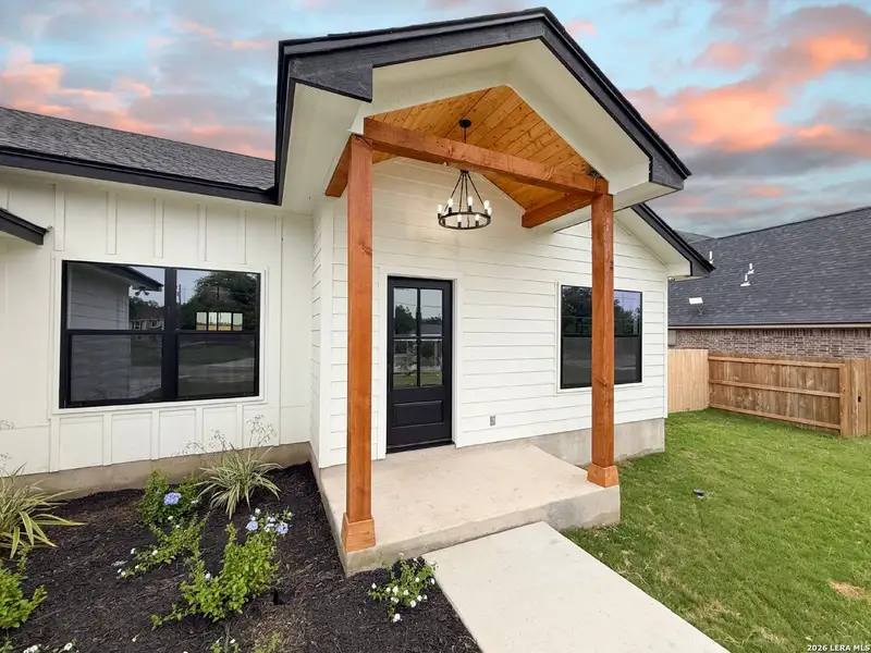 Exterior details and patio area of a home in , Devine (Image 4).