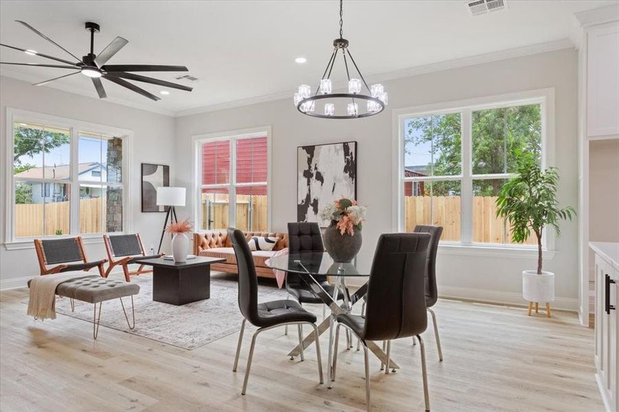 Dining room area. Fits larger table. Dining room area. Fits larger table.